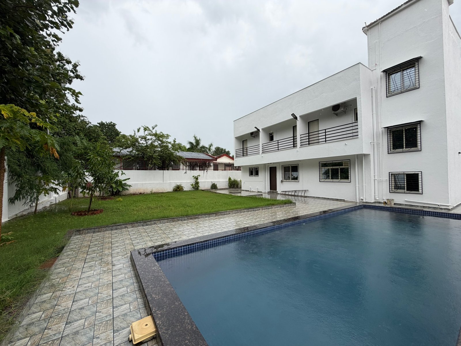 Nandan Villa Karjat, white villa with private pool and lawn